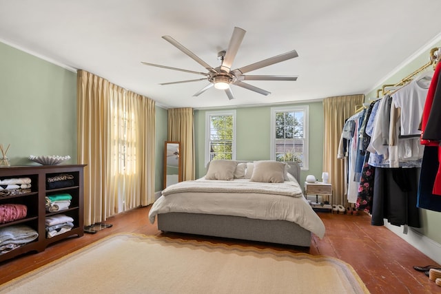 79 Silver St, Dover, NH 03820 - bedroom featuring wood finished floors, a ceiling fan, and crown molding
