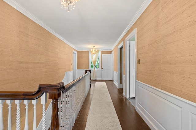 79 Silver St, Dover, NH 03820 - hall with a chandelier, ornamental molding, wainscoting, an upstairs landing, and a decorative wall