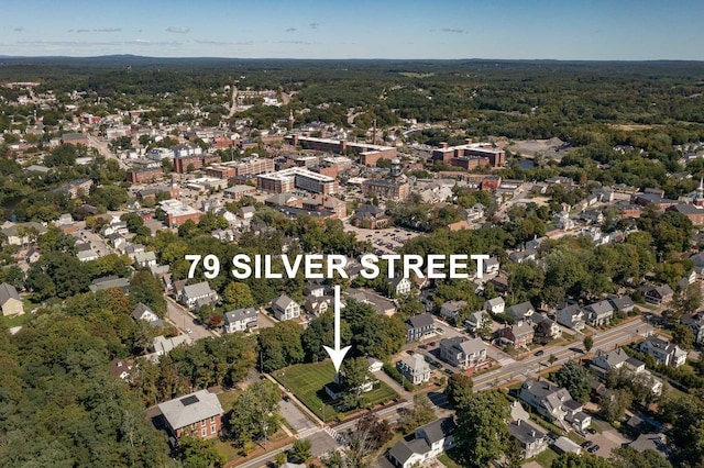 79 Silver St, Dover, NH 03820 - view of property location with a heavily wooded area