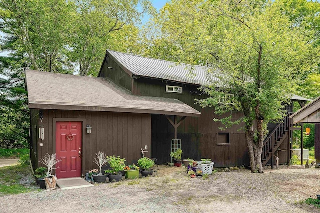 253 French Rd, Henniker, NH 03242 - rustic home with stairs and roof with shingles