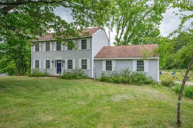 401 River Rd, Weare, NH 03281 - colonial inspired home with a front yard, a chimney, and roof with shingles