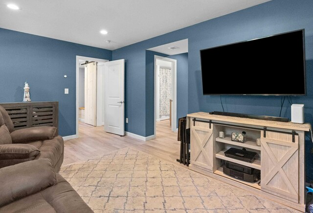 4 Crestview Ter, Stratham, NH 03885 - living area with baseboards, light wood finished floors, and recessed lighting