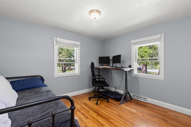 4 Crestview Ter, Stratham, NH 03885 - home office with light wood-style flooring and baseboards