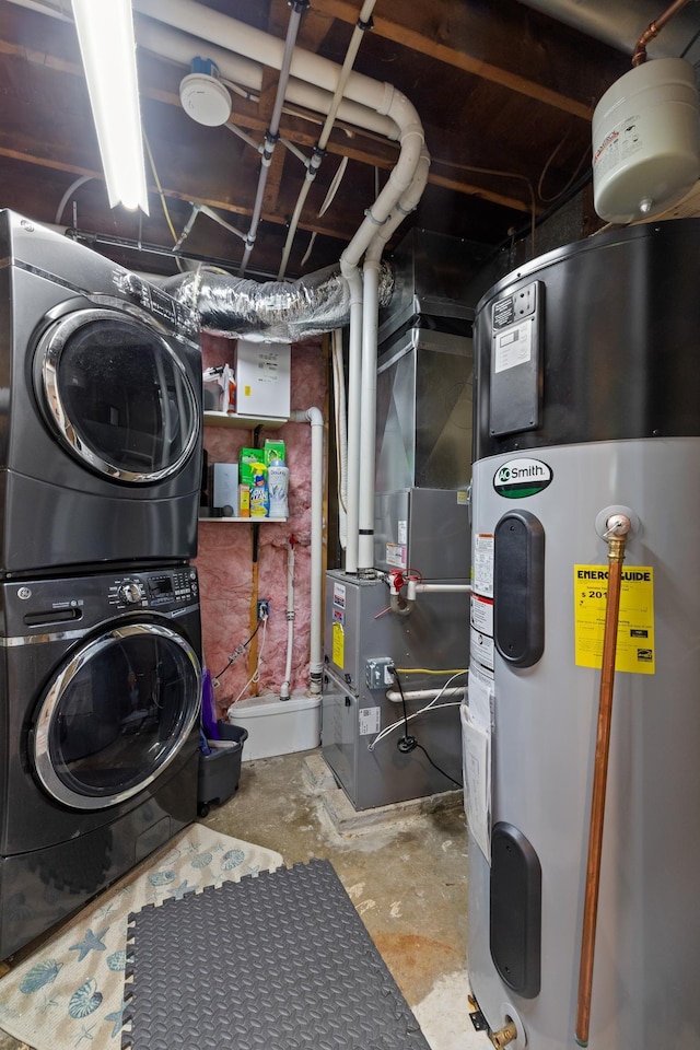 4 Crestview Ter, Stratham, NH 03885 - unfinished below grade area featuring stacked washer / dryer, water heater, and heating unit