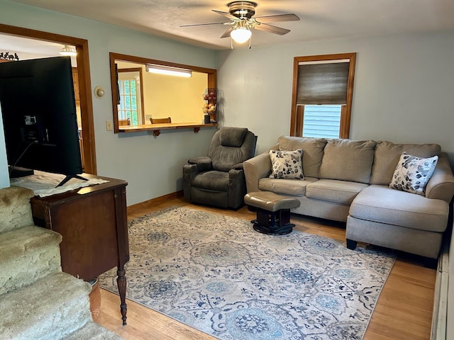 348 Ridge Rd, Northwood, NH 03261 - living room with wood finished floors, ceiling fan, and baseboards