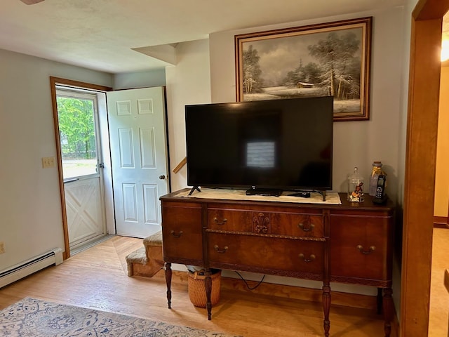 348 Ridge Rd, Northwood, NH 03261 - living room with baseboard heating and wood finished floors