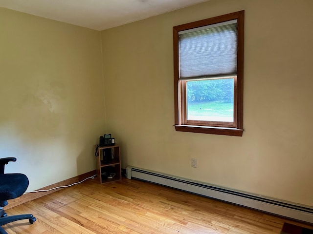 348 Ridge Rd, Northwood, NH 03261 - unfurnished office with a baseboard heating unit and light wood-style flooring