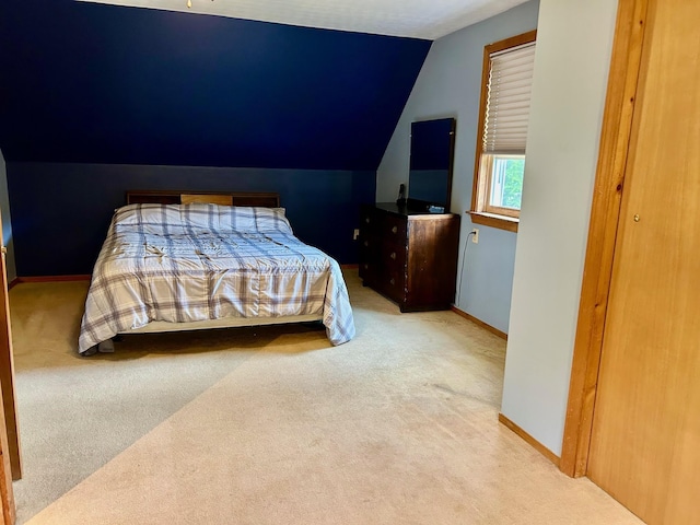 348 Ridge Rd, Northwood, NH 03261 - carpeted bedroom featuring baseboards and vaulted ceiling