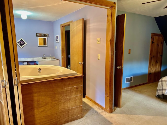 348 Ridge Rd, Northwood, NH 03261 - full bathroom with a bath, a sink, baseboards, and ceiling fan