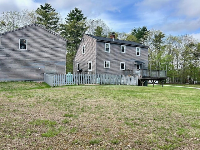 348 Ridge Rd, Northwood, NH 03261 - rear view of house with a chimney and a wooden deck