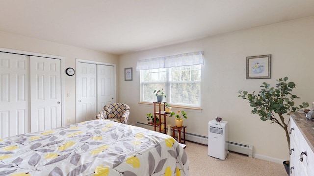 4 Bow Center Rd Unit B-3, Bow, NH 03304 - carpeted bedroom with multiple closets, baseboard heating, and baseboards