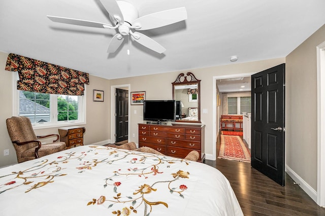 7 Lilac Ct Unit 335, Nashua, NH 03062 - bedroom featuring dark wood finished floors, baseboards, and a ceiling fan