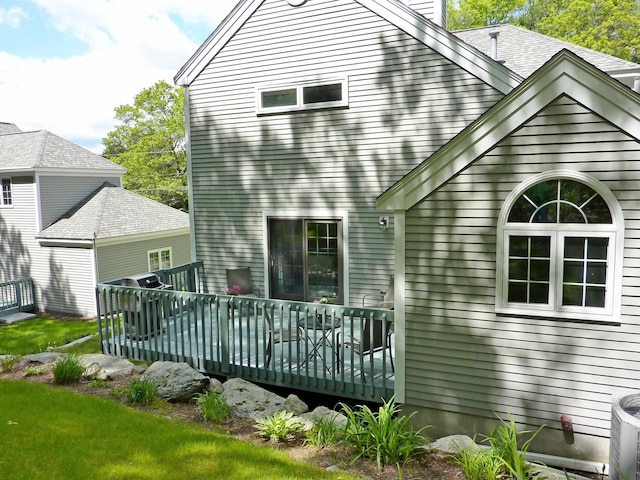 7 Lilac Ct Unit 335, Nashua, NH 03062 - rear view of property featuring a wooden deck
