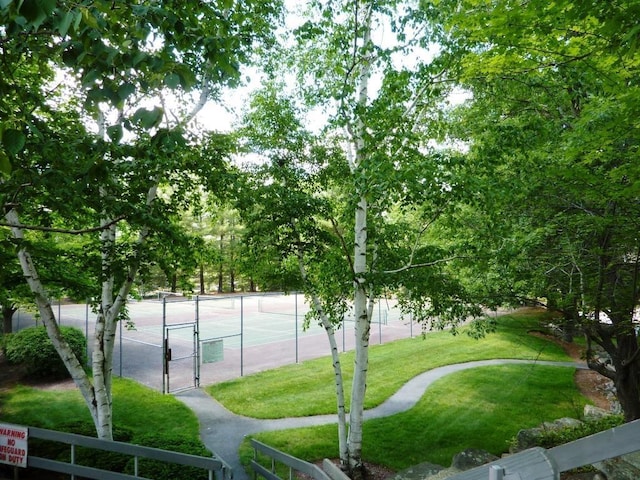 7 Lilac Ct Unit 335, Nashua, NH 03062 - view of tennis court with a gate