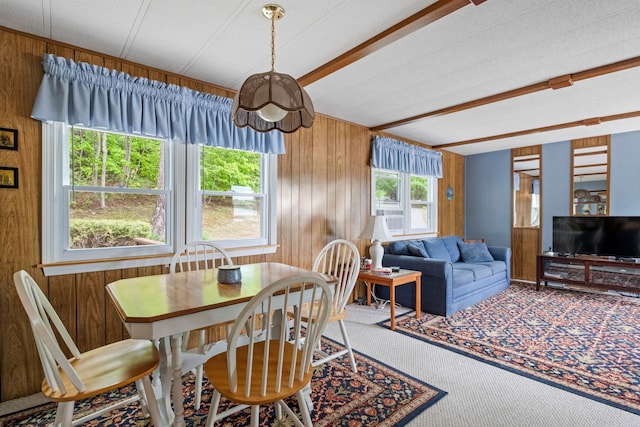 21 Pine Hill Dr, Barnstead, NH 03225 - dining area featuring carpet, wooden walls, and beam ceiling