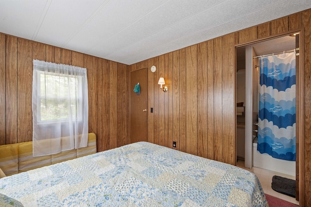 21 Pine Hill Dr, Barnstead, NH 03225 - bedroom with wooden walls and tile patterned floors
