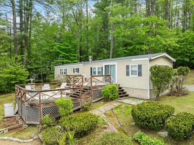 21 Pine Hill Dr, Barnstead, NH 03225 - rear view of house with a deck