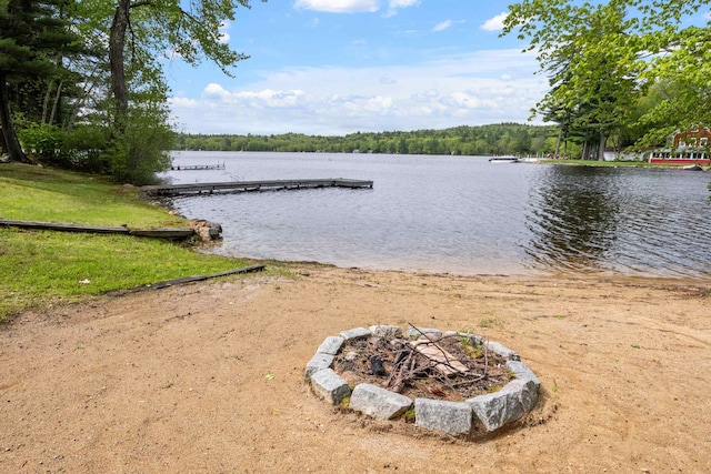 21 Pine Hill Dr, Barnstead, NH 03225 - water view with a dock and a fire pit