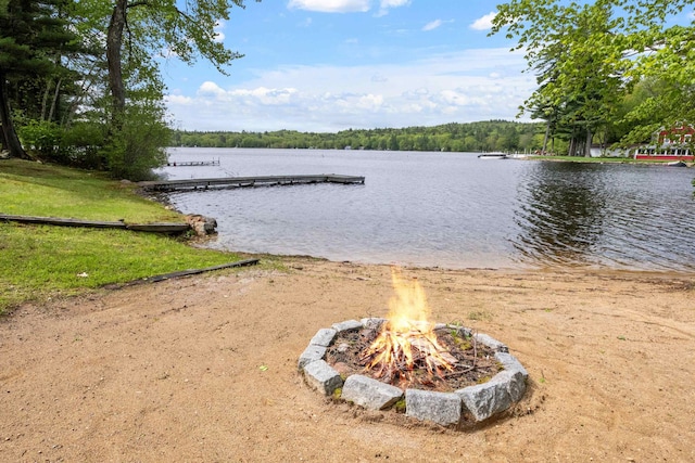 21 Pine Hill Dr, Barnstead, NH 03225 - water view with a fire pit and a boat dock