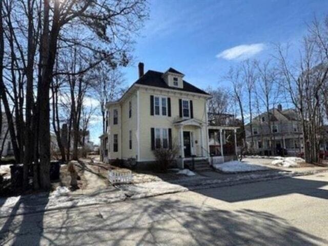 35-37 Courtland St, Nashua, NH 03060 - traditional style home with a chimney