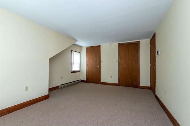 212 W Main St, Hillsborough, NH 03244 - bonus room featuring baseboard heating, light colored carpet, and baseboards