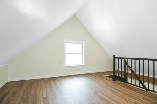 521 Wilson St, Manchester, NH 03103 - bonus room featuring wood finished floors, lofted ceiling, and baseboards