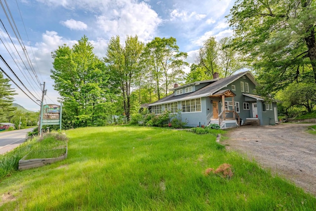 57 Main St, Woodstock, NH 03262 - view of front of property featuring a chimney