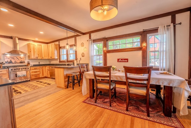 57 Main St, Woodstock, NH 03262 - dining area with light wood-style floors, beamed ceiling, and recessed lighting