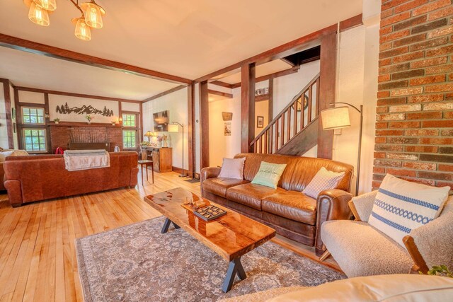 57 Main St, Woodstock, NH 03262 - living room featuring wood-type flooring and stairs