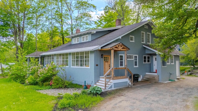 57 Main St, Woodstock, NH 03262 - bungalow-style house featuring a chimney and roof with shingles