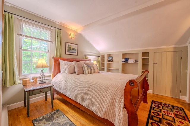57 Main St, Woodstock, NH 03262 - bedroom with lofted ceiling, light wood-style flooring, and baseboards