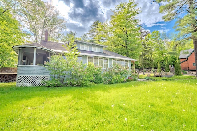 57 Main St, Woodstock, NH 03262 - view of yard featuring a sunroom
