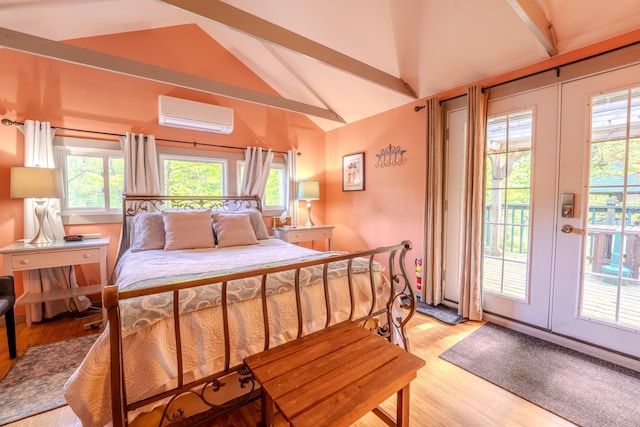 57 Main St, Woodstock, NH 03262 - bedroom featuring a wall mounted AC, access to exterior, light wood-style floors, and french doors
