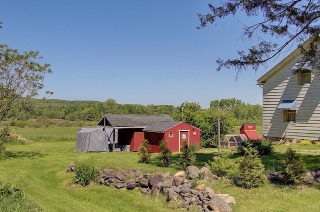 398 N Rd, Milton, VT 05468 - view of green lawn with an outdoor structure and an exterior structure