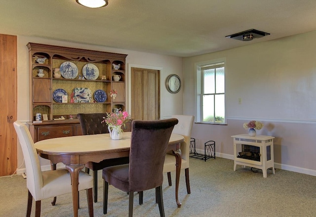 398 N Rd, Milton, VT 05468 - dining room with light carpet and baseboards
