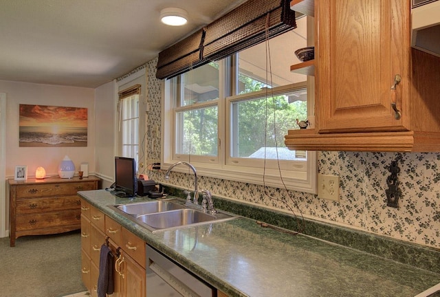 398 N Rd, Milton, VT 05468 - kitchen featuring a sink, dishwasher, wallpapered walls, dark countertops, and brown cabinetry