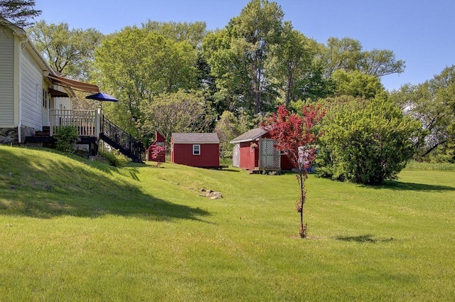 398 N Rd, Milton, VT 05468 - view of grassy yard featuring a deck and stairs