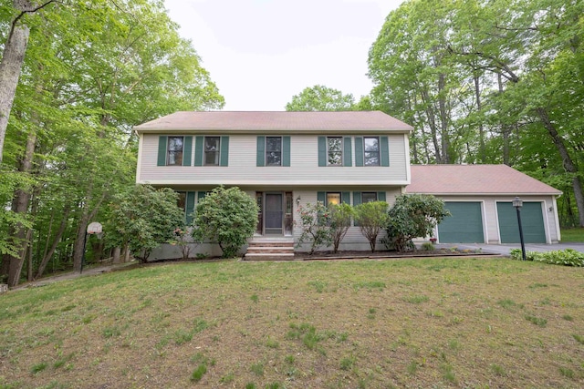 16 Berkeley St, Pelham, NH 03076 - colonial inspired home with driveway, a garage, and a front yard