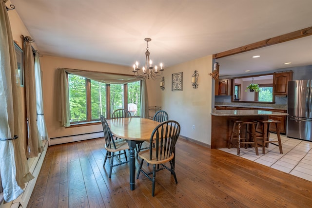 16 Berkeley St, Pelham, NH 03076 - dining room featuring baseboard heating, a chandelier, light wood-type flooring, baseboards, and recessed lighting