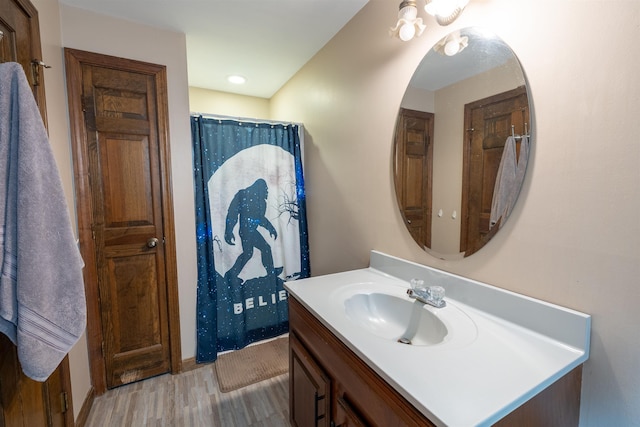 16 Berkeley St, Pelham, NH 03076 - bathroom with vanity and wood finished floors