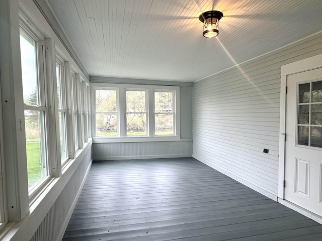 217 Clyde St, Newport City, VT 05855 - unfurnished sunroom with wood-type flooring and wooden walls
