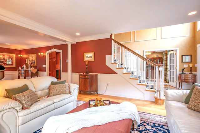 16 Gilboa Ln, Nashua, NH 03062 - living area with wood finished floors, decorative columns, ornamental molding, recessed lighting, and a wainscoted wall