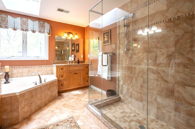16 Gilboa Ln, Nashua, NH 03062 - bathroom featuring vanity, plenty of natural light, a bath, and a stall shower