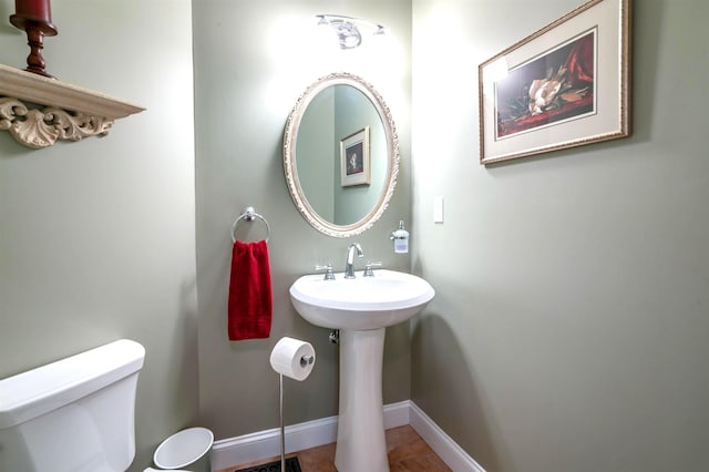 16 Gilboa Ln, Nashua, NH 03062 - half bath featuring toilet and baseboards