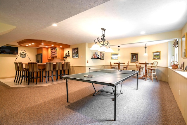 16 Gilboa Ln, Nashua, NH 03062 - playroom featuring wet bar, carpet, wainscoting, and recessed lighting