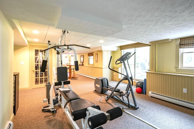 16 Gilboa Ln, Nashua, NH 03062 - workout room with baseboard heating, a baseboard heating unit, carpet flooring, and baseboards
