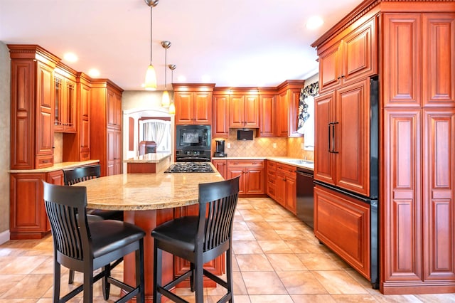 16 Gilboa Ln, Nashua, NH 03062 - kitchen with black appliances, a center island, decorative backsplash, light stone countertops, and recessed lighting