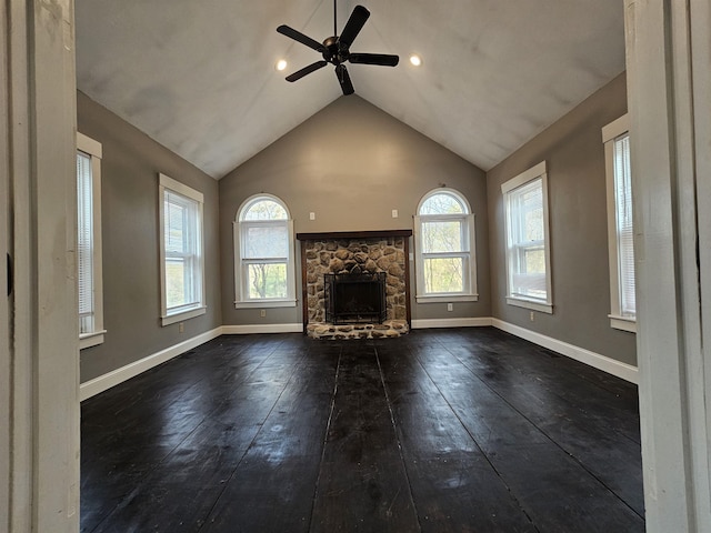 436 Mammoth Rd, Pelham, NH 03076 - unfurnished living room featuring dark wood-type flooring, healthy amount of natural light, a fireplace, a ceiling fan, and lofted ceiling