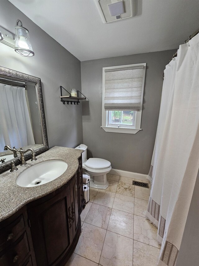 436 Mammoth Rd, Pelham, NH 03076 - full bath with vanity, toilet, marble finish flooring, baseboards, and a shower with curtain