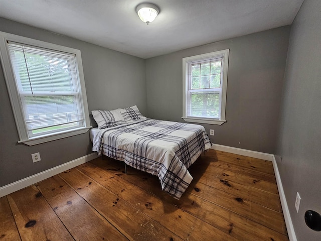 436 Mammoth Rd, Pelham, NH 03076 - bedroom featuring wood-type flooring and baseboards